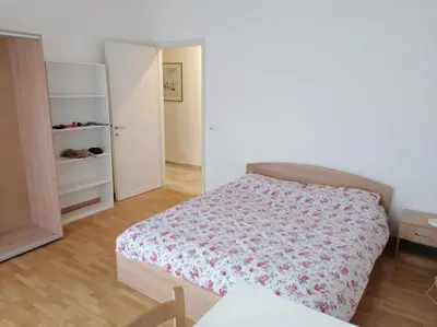 Letto o letti in una camera di casa a due passi dal centro