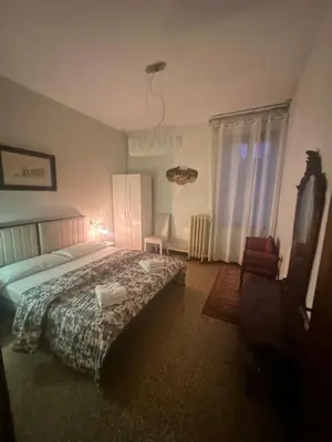 Letto o letti in una camera di Rosa apartment