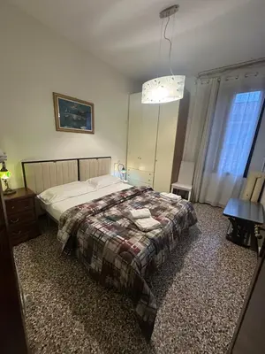 Letto o letti in una camera di Rosa apartment