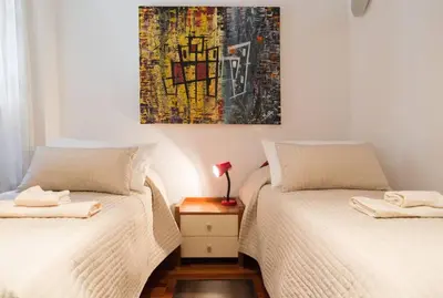 Letto o letti in una camera di FEEL@HOME Venice BIENNALE