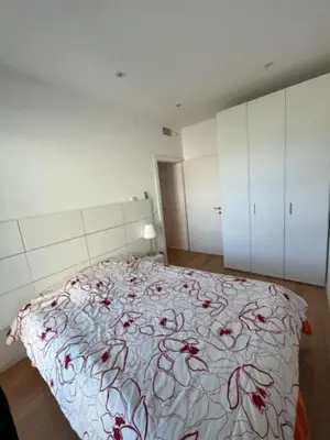 Letto o letti in una camera di APPARTAMENTO FRONTEMARE DA MICHI E2
