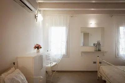 Letto o letti in una camera di Piccola Venezia Apartments