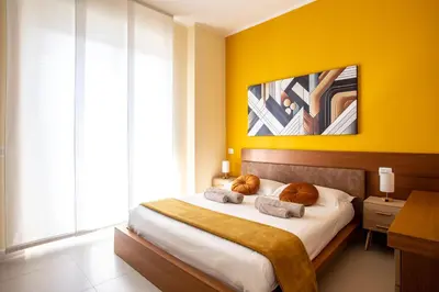 Letto o letti in una camera di Jesolo Vista Lido - Family Deluxe Apartment