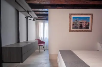 Letto o letti in una camera di San Pietro Cozy Studio R&R