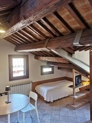 Letto o letti in una camera di Ca' Marcello Terrace city 511 Altana Venice WIFI
