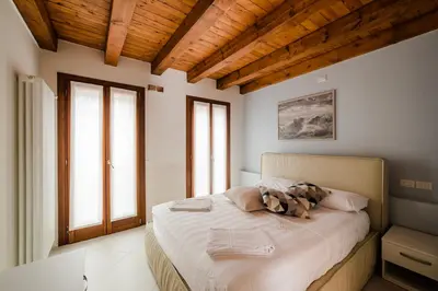 Letto o letti in una camera di Alla Corte