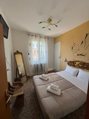 Letto o letti in una camera di Hotel Antico Capon