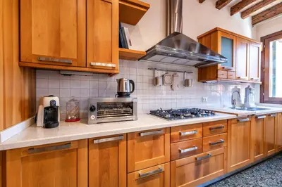 Cucina o angolo cottura di Al Campanile View and Terrace by Wonderful Italy