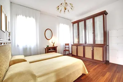 Letto o letti in una camera di Ca' Bernardo