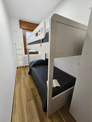 Letto o letti in una camera di appartamento la chiocciola