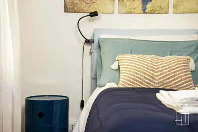 Letto o letti in una camera di HT - Elegante mini in Prato della Valle