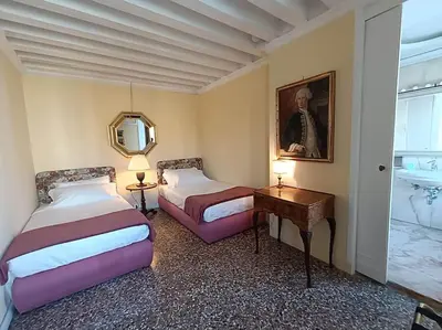 Letto o letti in una camera di Palazzo Querini Accademia