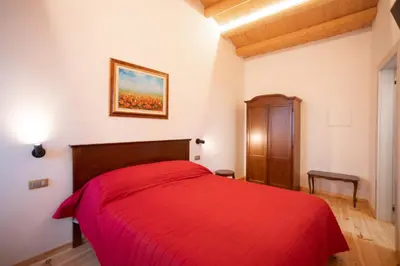 Letto o letti in una camera di B&B Basta Bussare