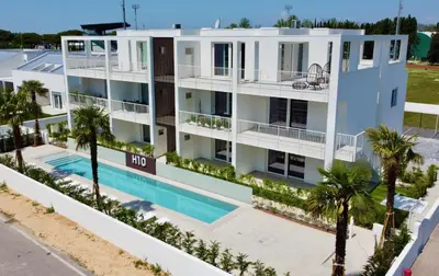 Piscina di H10 - Home Immobiliare Jesolo o nelle vicinanze