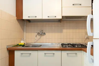 Cucina o angolo cottura di [Blu Kobler] - Ampio appartamento fronte mare
