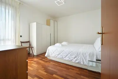 Letto o letti in una camera di Villafranca Relaxing apartment