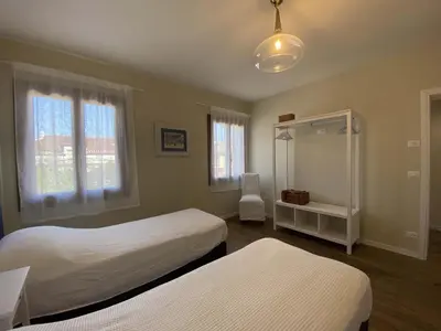 Letto o letti in una camera di Ca' Magna Apartment