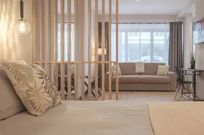 Letto o letti in una camera di A 3 minuti dal centro storico In Style Apartment con parcheggio gratuito