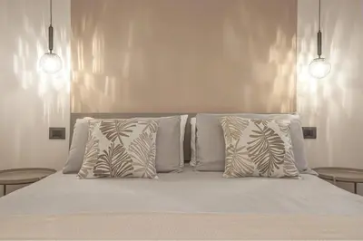 Letto o letti in una camera di A 3 minuti dal centro storico In Style Apartment con parcheggio gratuito