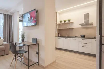 Cucina o angolo cottura di A 3 minuti dal centro storico In Style Apartment con parcheggio gratuito