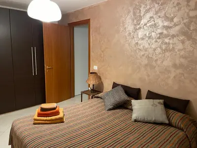 Letto o letti in una camera di Ali