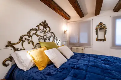 Letto o letti in una camera di Ca' degli Angeli
