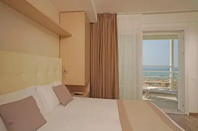 Letto o letti in una camera di Hotel Strand a frontemare