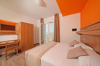 Letto o letti in una camera di Hotel Strand a frontemare