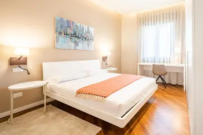 Letto o letti in una camera di San Michele Modern Apartment - con balcone!