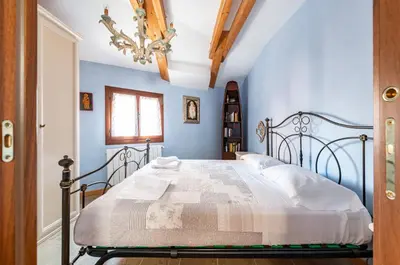Letto o letti in una camera di GuestHost - Arsenale Duplex Apartment