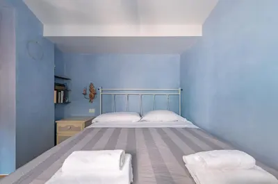 Letto o letti in una camera di GuestHost - Arsenale Duplex Apartment