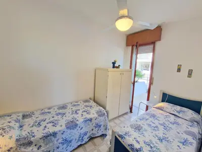 Letto o letti in una camera di Tellina FronteMare