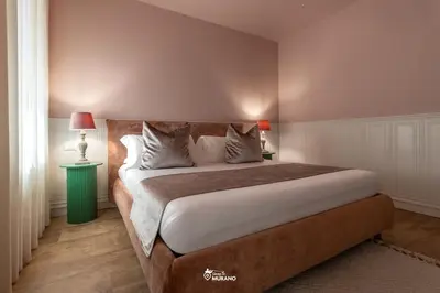 Letto o letti in una camera di MISTRO House by Sleep in MURANO