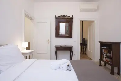 Letto o letti in una camera di Residence Santa Marta by Halldis