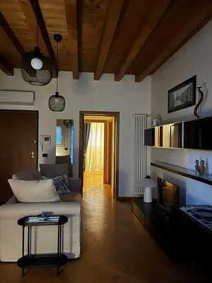 Area soggiorno di Venezia,Giudecca appartamento con giardino privato
