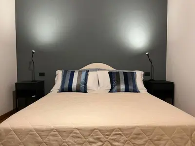 Letto o letti in una camera di Venezia,Giudecca appartamento con giardino privato