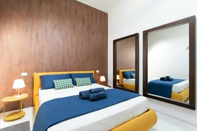 Letto o letti in una camera di Girolamo Loft by Welchome