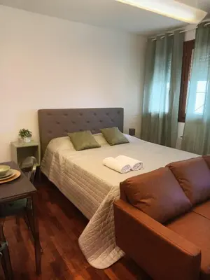 Letto o letti in una camera di Suite Alle Corti - Treviso