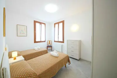 Letto o letti in una camera di DolceVita Apartments N 515 Redentore