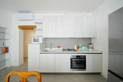 Cucina o angolo cottura di DolceVita Apartments N 515 Redentore