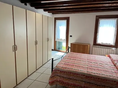 Letto o letti in una camera di RESIDENCE CA VENEXIAN
