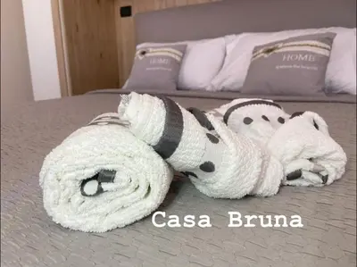 Letto o letti in una camera di Casa Bruna - appartamento Renato