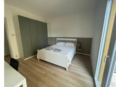Letto o letti in una camera di Casa Bea & Stefi