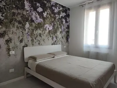 Letto o letti in una camera di AL PONTE design apartment