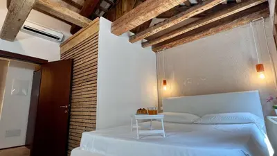 Letto o letti in una camera di Residence Romantic Grand Canal