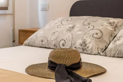 Letto o letti in una camera di GIGI HOUSE [appartamento PIAZZA MAZZINI] 300m dal mare