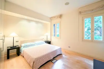 Letto o letti in una camera di Ca' Santa Eufemia, cozy and classy, sleep 4