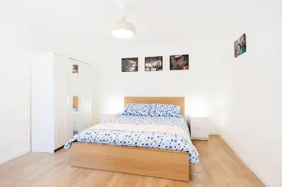 Letto o letti in una camera di Funzionale e riservato