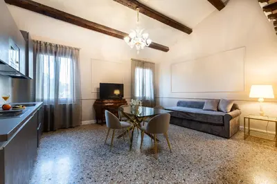 Letto o letti in una camera di San Vio Palace Luxury Apartments