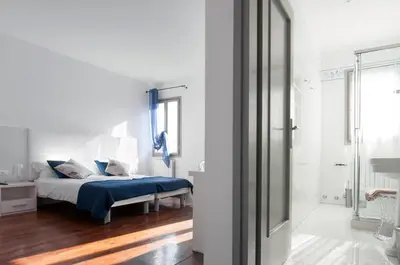 Letto o letti in una camera di Scrovegni Room & Breakfast